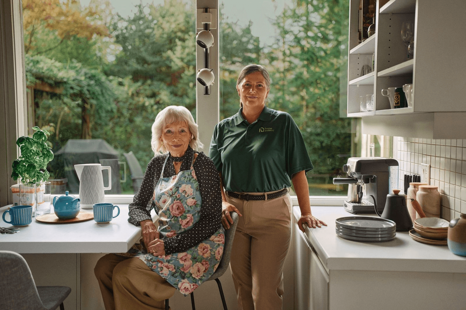 A Home Instead Care Pro with an adult.