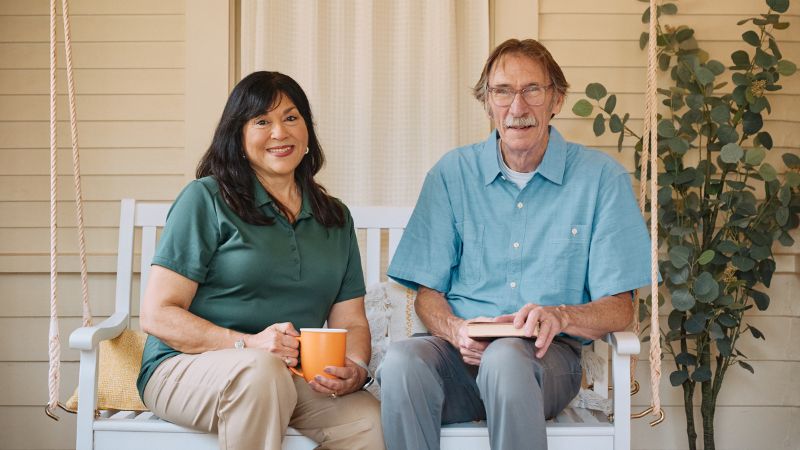 Home Instead caregiver sitting with their senior client in Tustin, CA