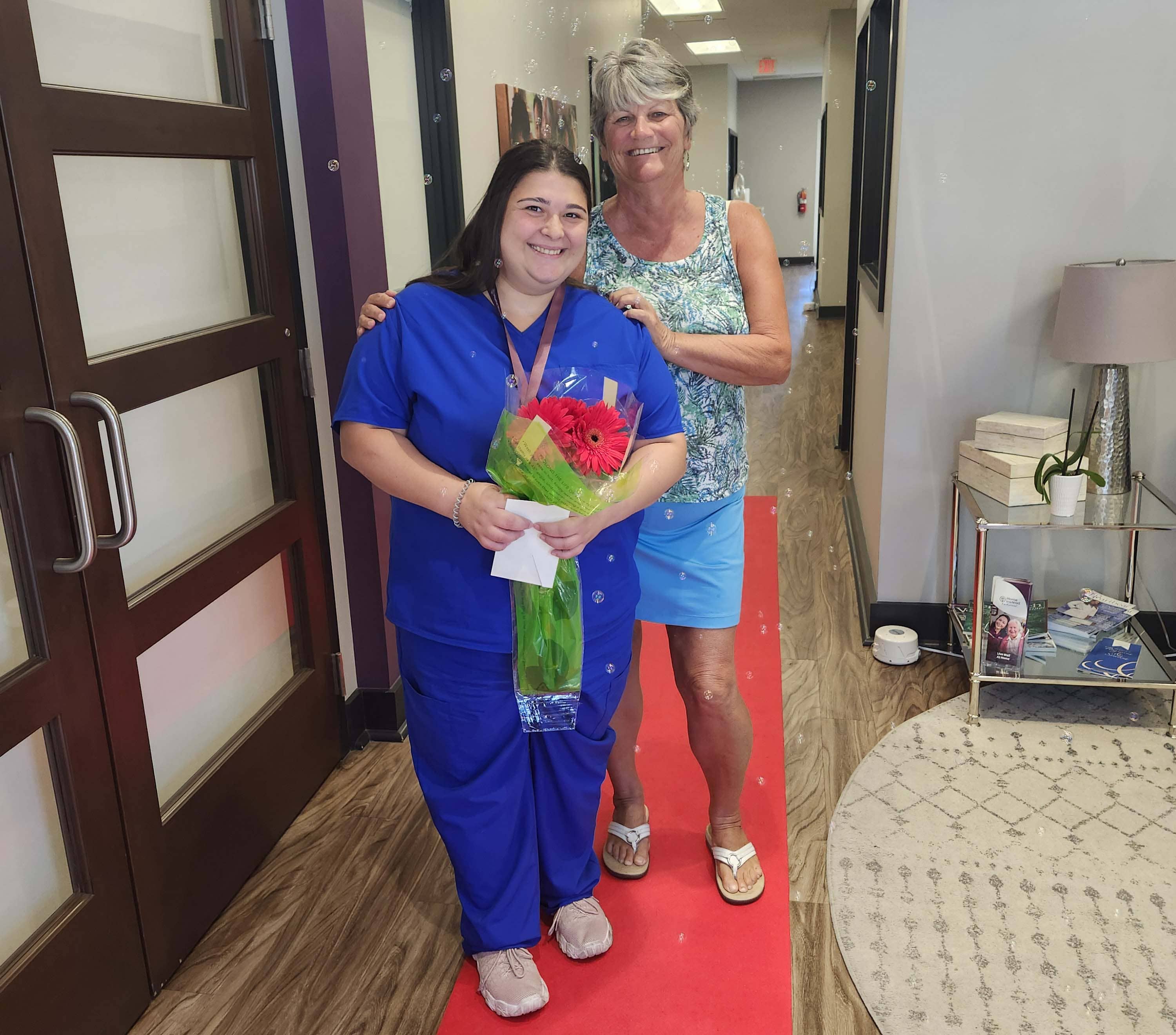 Newest Care Professional Samantha with Nurse Kathy walking the Red Carpet 1 