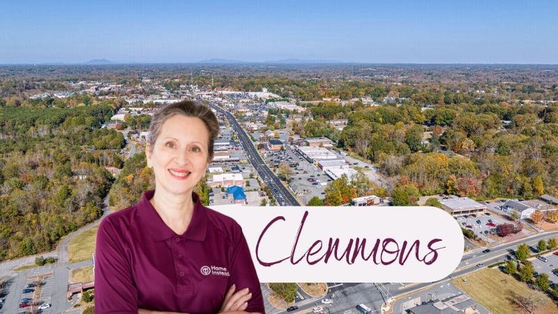 Home Instead caregivers with Clemmons, NC in the background