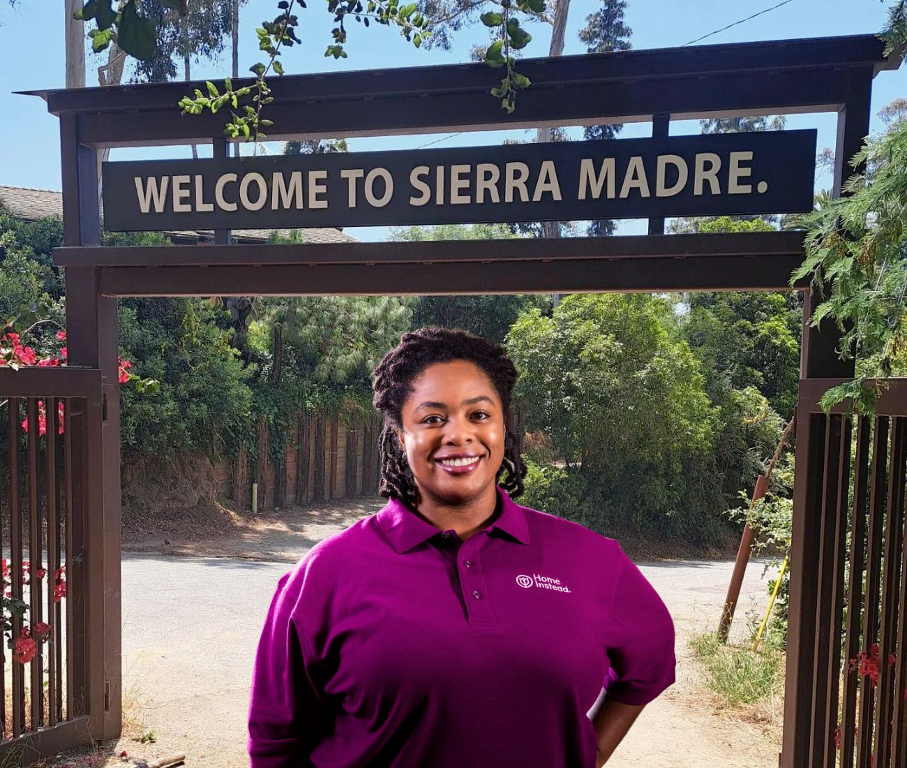 Home Instead caregiver with Sierra Madre, CA in the background